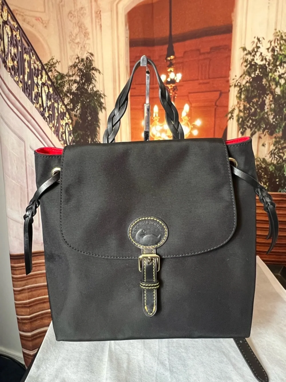 Dooney & Bourke Nylon Flap Backpack features a distinct braided top handle 🌹 - Picture 4 of 13